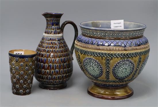 Three pieces of Doulton Lambeth ware, tallest 23.5cm